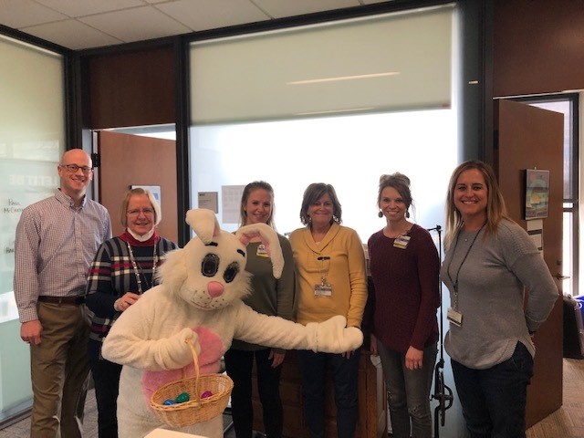 A bunny with college staff